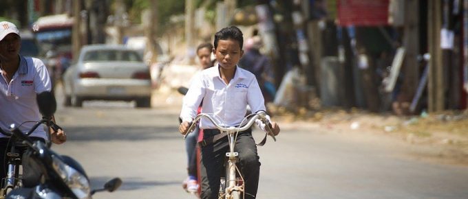 Cambodia Kid on bike