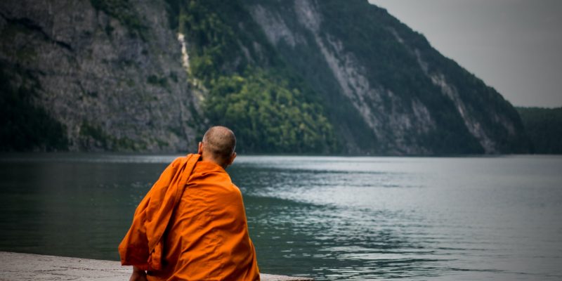 Monk Setting by the lake